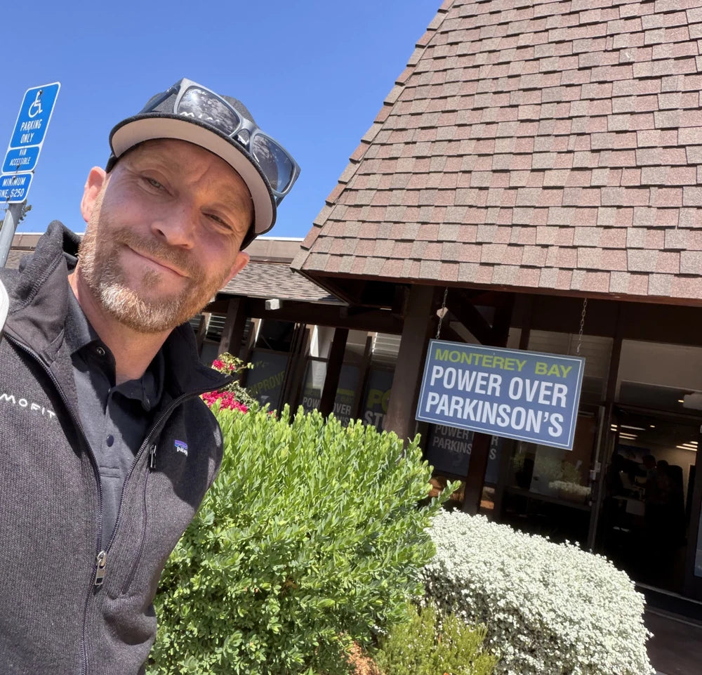 Chris outside Monterey Bay Power Over Parkinson’s. Open the Instagram post.